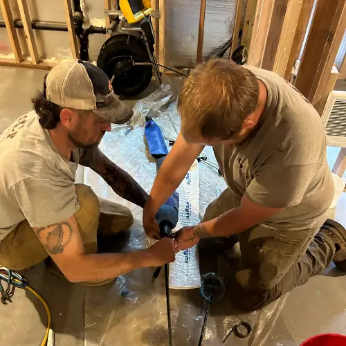 Two Clark County Plumbing technicians preparing a home for plumbing services in Mt Vista